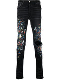 AMIRI skinny jeans con estampado de salpicaduras de pintura | negro | Image 1