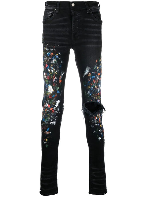 AMIRI skinny jeans con estampado de salpicaduras de pintura | negro | Image 1